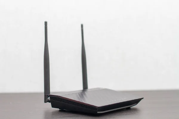 depositphotos_344455706-stock-photo-black-wireless-router-wifi-with