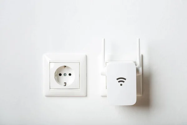 depositphotos_461708646-stock-photo-white-repeater-indoors-home-outlet